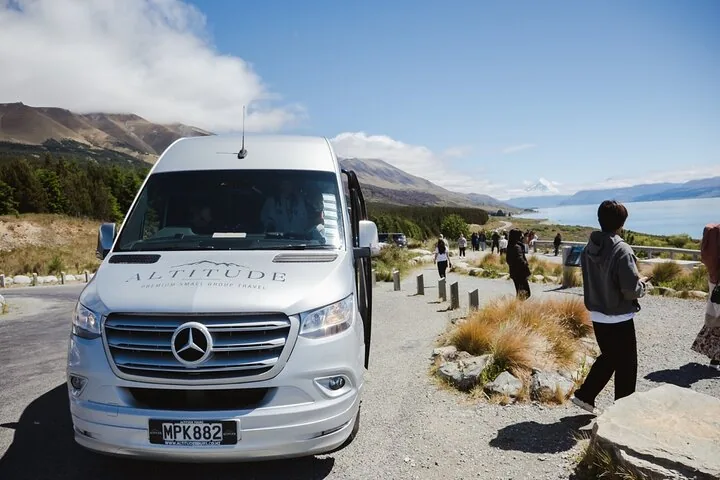 Silver Altitude Tours Mercedes minibus parked at the Lake Pūkaki lookout